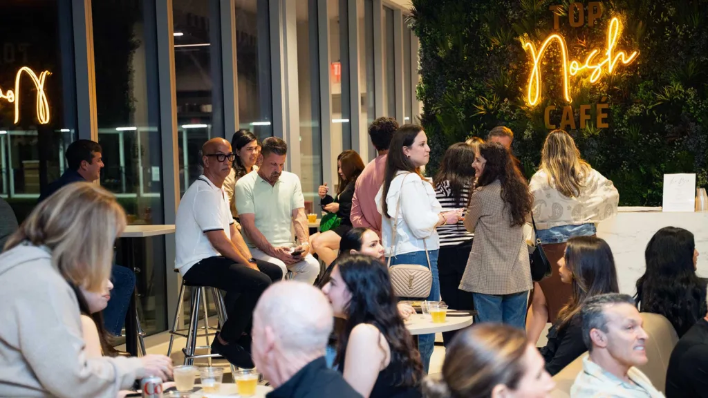 Patrons enjoy coffee and light bites at the Top Nosh Cafe inside The Hub at Temple Beth Am